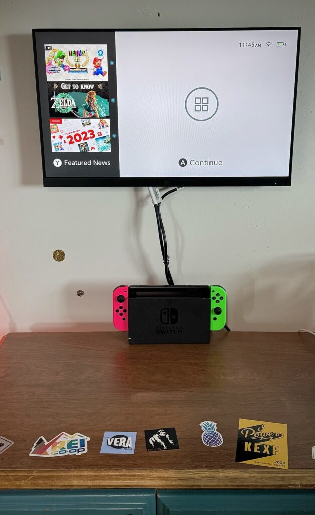Nintendo Switch connected to DIY monitor flush wall mount project.